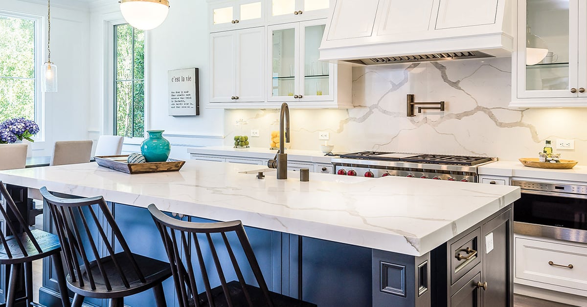 Bright kitchen with white and gray quartz countertops